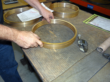 Brass Rings being ground to size