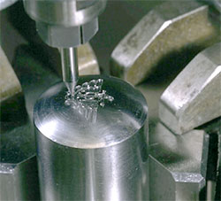 Small die being machined